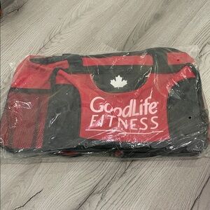 GoodLife Fitness Red and Black Travel Duffel with Maple Logo